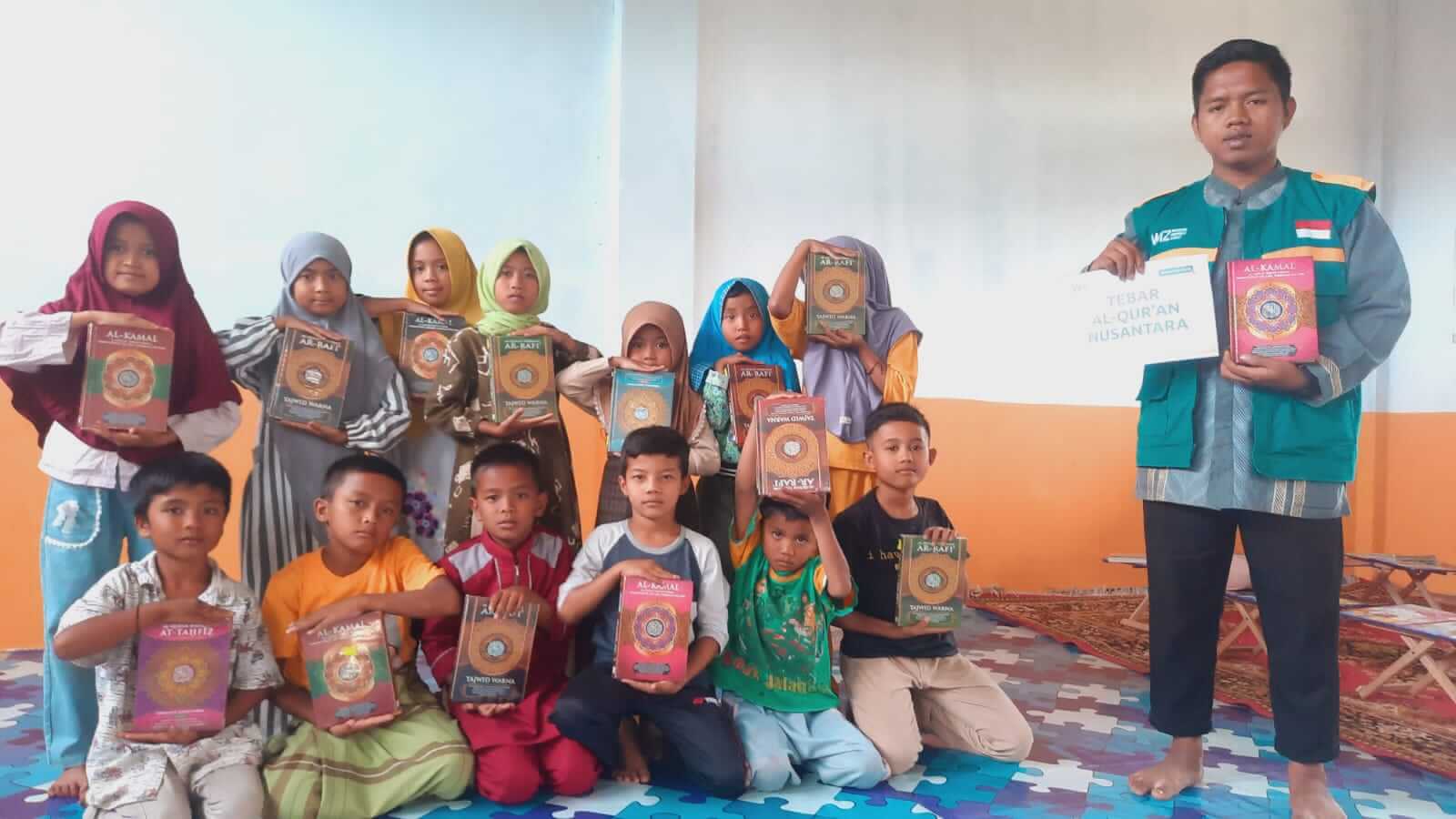 Distribusi Al-Qur’an Rumah Qur’an Ilmu Yaqin Solok Sumatera Barat