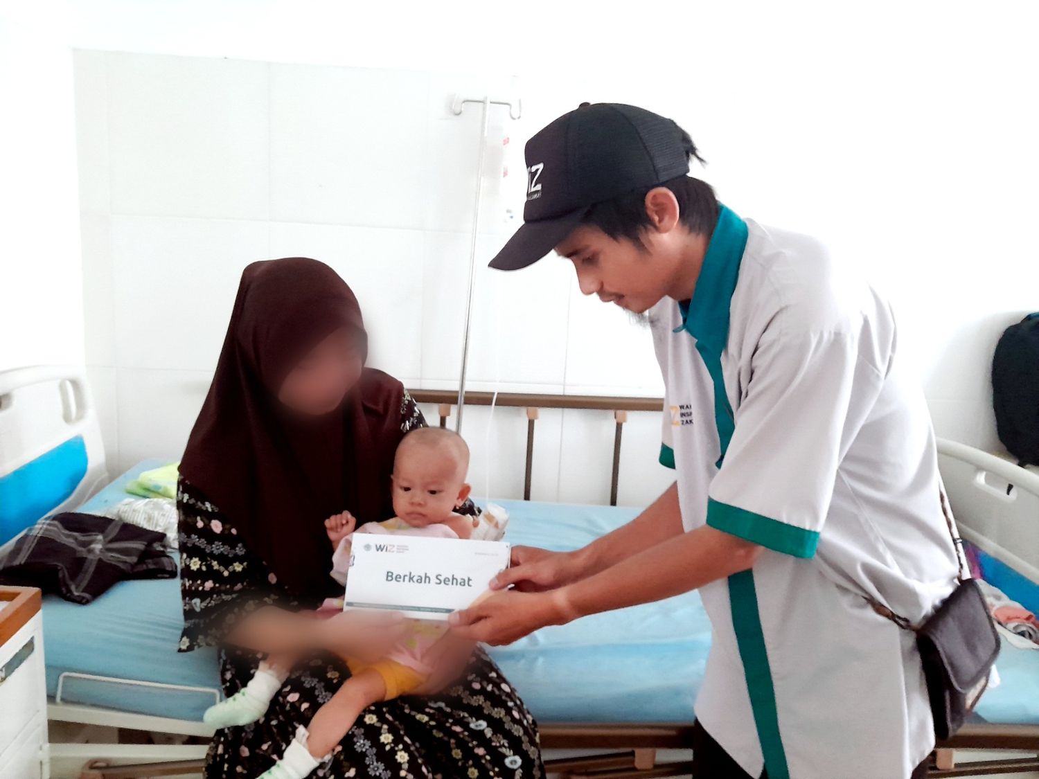 WIZ Parigi Salurkan Santunan untuk Bayi 10 Bulan yang Sedang Dirawat di RSUD Anuntaloko Parigi